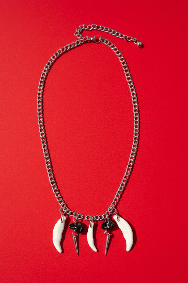Coyote Teeth with Black Lava Beads